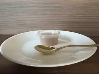 SILKOA 35 cc horeca-format chilled portion served on a plate with a spoon